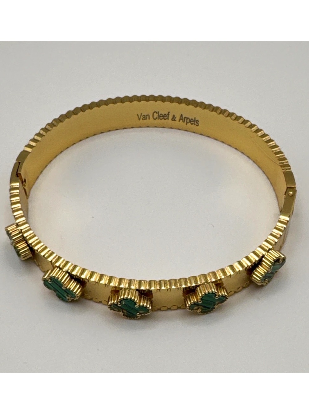 Van Cleef & Arpels Gold Bracelet with Green Accents